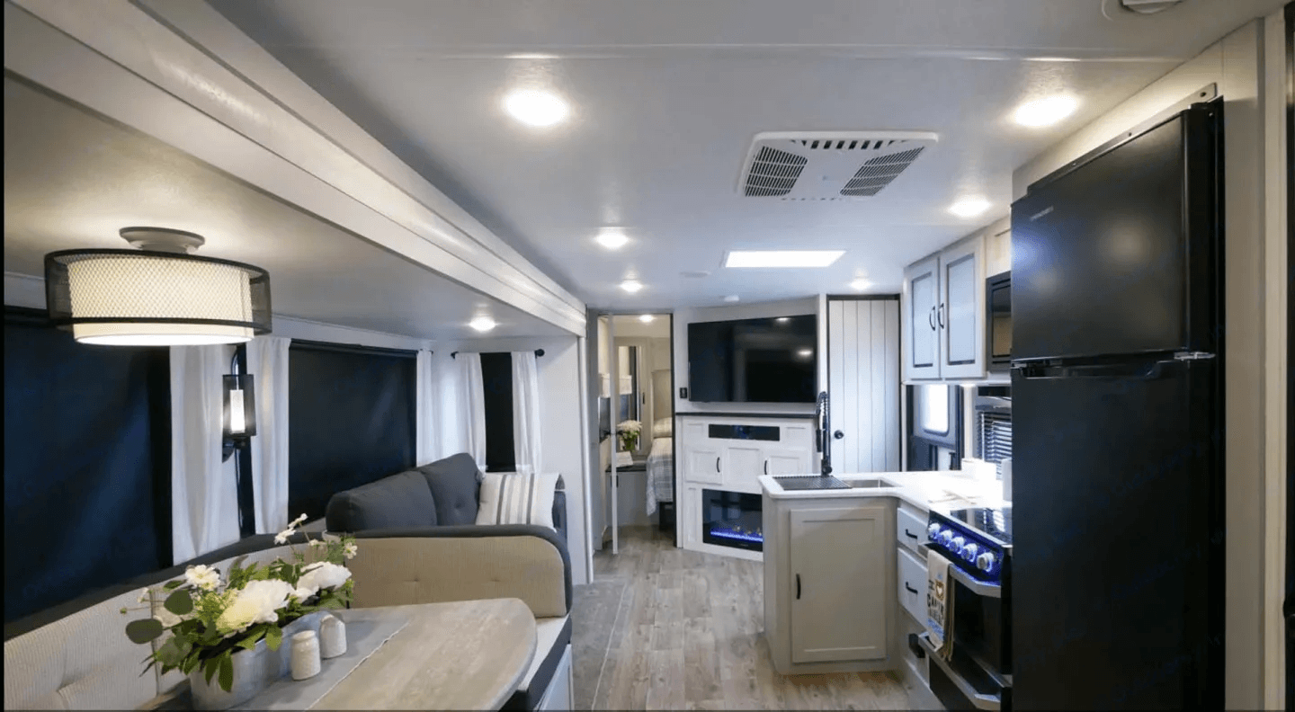 Kitchen with refrigerator and overhead cabinets