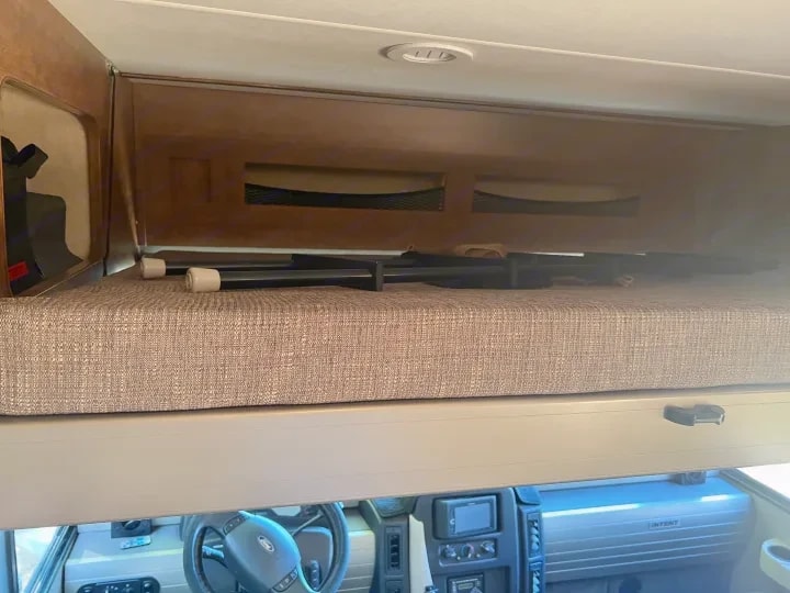 Cab-over bunk storage area above the driver and passenger seats