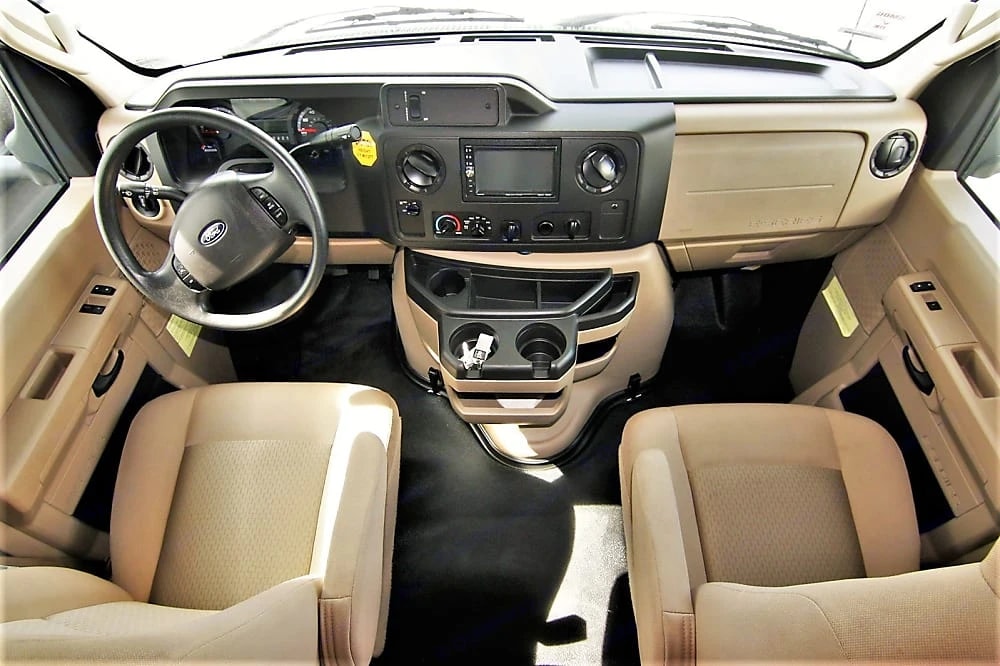 Front cab dashboard and both captain's chairs viewed head-on