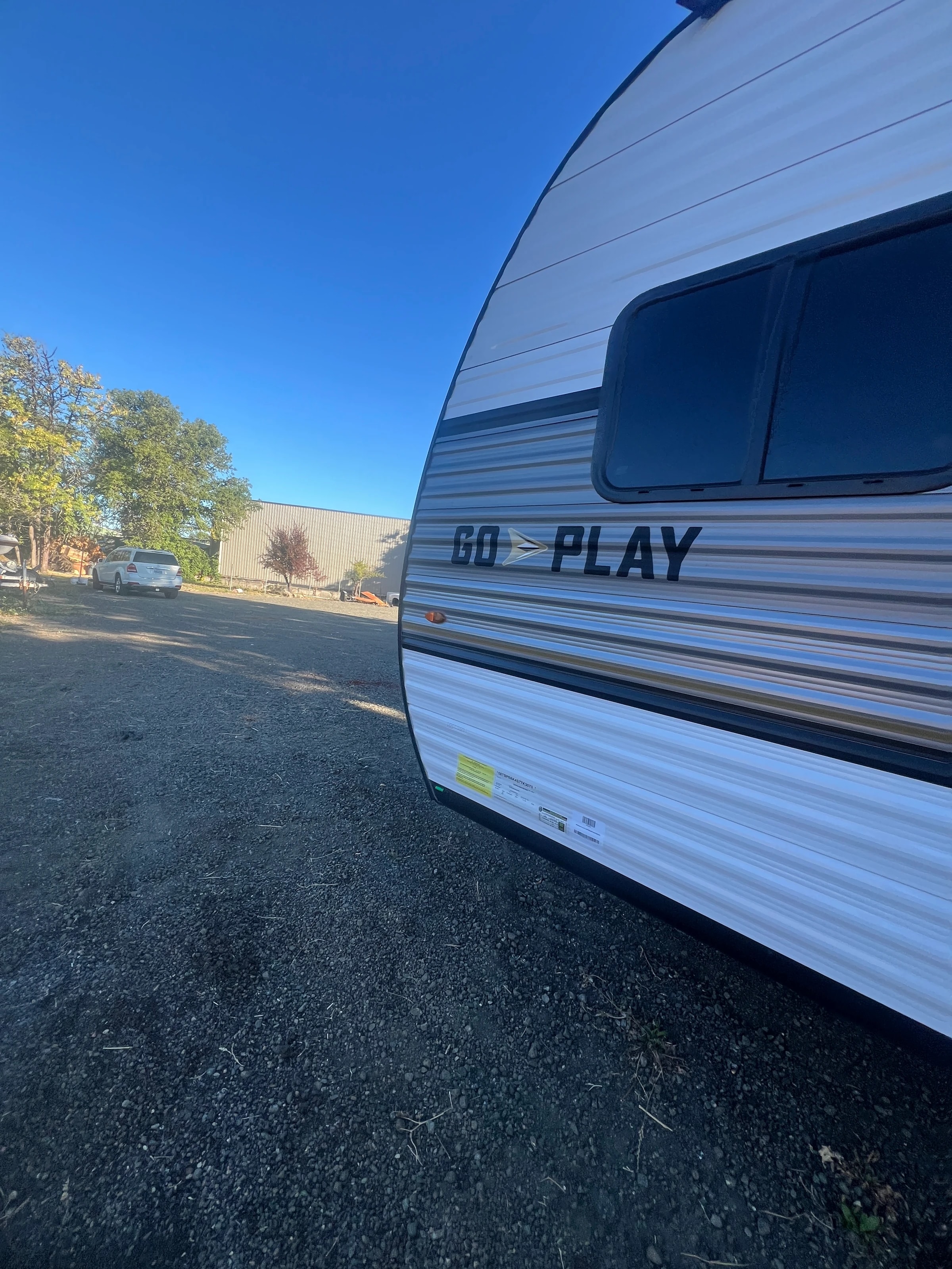 Front corner of the trailer carrying the Go Play decal